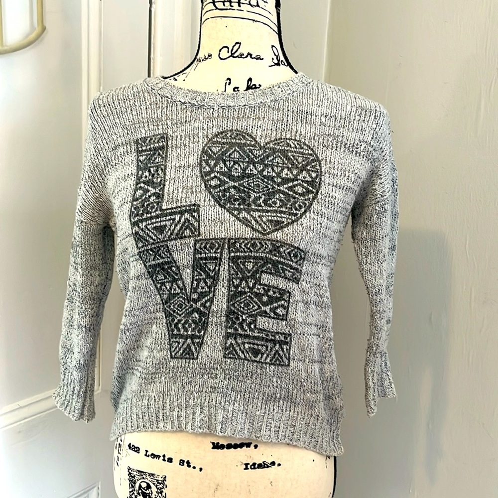 Gray and Black cropped high low quarter sleeve sweater from Almost Famous.